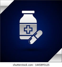 Silver Medicine bottle and pills icon isolated on dark blue background. Bottle pill sign. Pharmacy design.  Vector Illustration