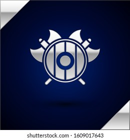 Silver Medieval shield with crossed axes icon isolated on dark blue background. Battle axe, executioner axe.  Vector Illustration
