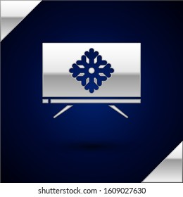 Silver Merry Christmas on television and snowflake icon isolated on dark blue background. Happy New Year.  Vector Illustration