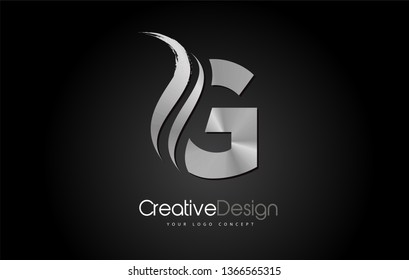 Silver Metal G Letter Design Brush Paint Stroke. Letter Logo on Black Background