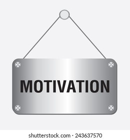 silver metallic motivation sign hanging on the wall  