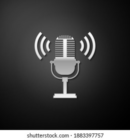 Silver Microphone icon isolated on black background. On air radio mic microphone. Speaker sign. Long shadow style. Vector.