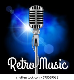 Silver microphone on the blue blurred background