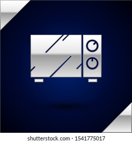 Silver Microwave oven icon isolated on dark blue background. Home appliances icon.  Vector Illustration
