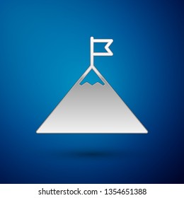 Silver Mountains and flag on top icon isolated on blue background. Symbol of victory or success concept. Vector Illustration