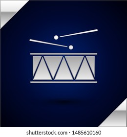Silver Musical instrument drum and drum sticks icon isolated on dark blue background.  Vector Illustration