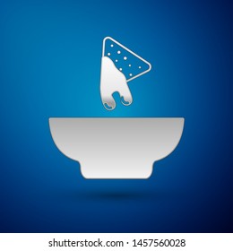 Silver Nachos in plate icon isolated on blue background. Tortilla chips or nachos tortillas. Traditional mexican fast food. Vector Illustration