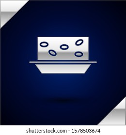 Silver Nougat with nuts icon isolated on dark blue background.  Vector Illustration