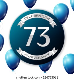 Silver number seventy three years anniversary celebration on blue circle paper banner with silver ribbon. Realistic blue balloons with ribbon on white background. Vector illustration.