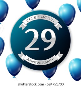 Silver number twenty nine years anniversary celebration on blue circle paper banner with silver ribbon. Realistic blue balloons with ribbon on white background. Vector illustration.