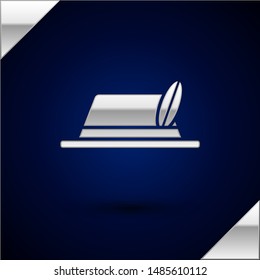 Silver Oktoberfest hat icon isolated on dark blue background. Hunter hat with feather. German hat.  Vector Illustration