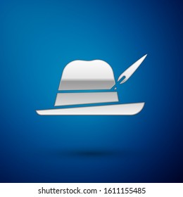 Silver Oktoberfest hat icon isolated on blue background. Hunter hat with feather. German hat.  Vector Illustration