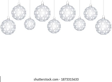 silver openwork Christmas balls on a white background
