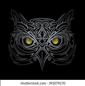 Silver owl head tattoo shape in the dark