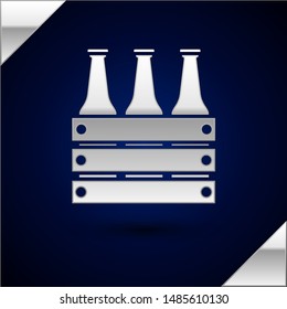 Silver Pack of beer bottles icon isolated on dark blue background. Wooden box and beer bottles. Case crate beer box sign.  Vector Illustration