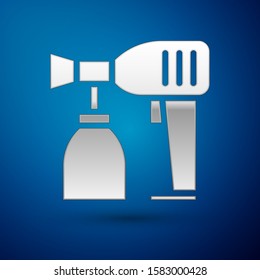 Silver Paint spray gun icon isolated on blue background.  Vector Illustration