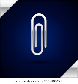 Silver Paper clip icon isolated on dark blue background.  Vector Illustration