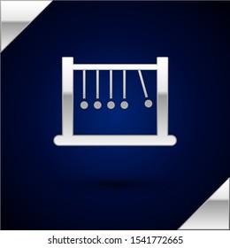 Silver Pendulum icon isolated on dark blue background. Newtons cradle.  Vector Illustration