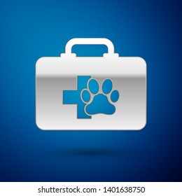 Silver Pet first aid kit icon isolated on blue background. Dog or cat paw print. Clinic box. Vector Illustration