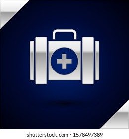 Silver Pet first aid kit icon isolated on dark blue background. Dog or cat paw print. Clinic box.  Vector Illustration