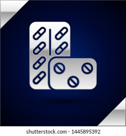 Silver Pills in blister pack icon isolated on dark blue background. Medical drug package for tablet: vitamin, antibiotic, aspirin.  Vector Illustration