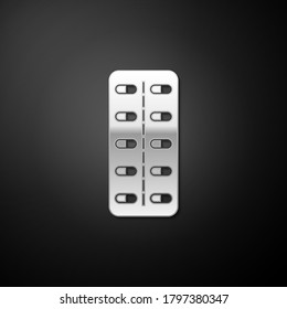 Silver Pills in blister pack icon isolated on black background. Medical drug package for tablet: vitamin, antibiotic, aspirin. Long shadow style. Vector.