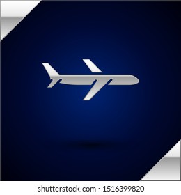 Silver Plane icon isolated on dark blue background. Flying airplane icon. Airliner sign.  Vector Illustration