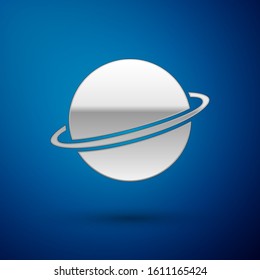 Silver Planet Saturn with planetary ring system icon isolated on blue background.  Vector Illustration