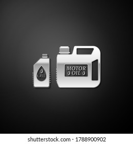 Silver Plastic canister for motor machine oil icon isolated on black background. Oil gallon. Oil change service and repair. Engine oil sign. Long shadow style. Vector.