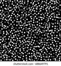 Silver points of confetti. Abstract chaotic scatter on a black background. Astral design. Vector illustration.