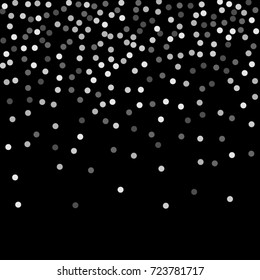 Silver points of confetti. Abstract chaotic scatter on a black background. Astral design. Vector illustration.