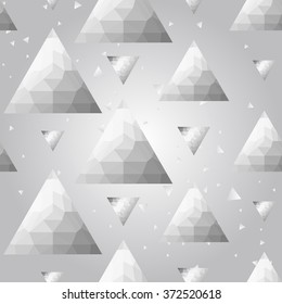 Silver polygonal shape: pyramid triangle on white silver sparkle background. Metal polygonal seamless pattern in hipster triangle low poly style. Silver background for vip, gift, website techno design