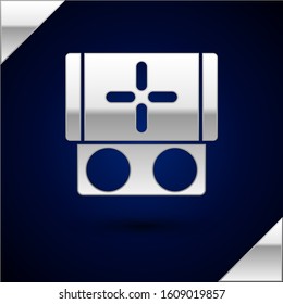 Silver Portable video game console icon isolated on dark blue background. Gamepad sign. Gaming concept.  Vector Illustration