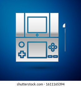 Silver Portable video game console icon isolated on blue background. Gamepad sign. Gaming concept.  Vector Illustration