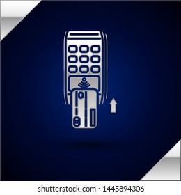 Silver Pos terminal with inserted credit card icon isolated on dark blue background. Payment terminal transaction. Pay by card.  Vector Illustration