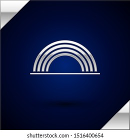 Silver Rainbow with clouds icon isolated on dark blue background.  Vector Illustration