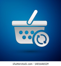 Silver Refresh shopping basket icon isolated on blue background. Online buying concept. Delivery service sign. Update supermarket basket symbol. Vector Illustration
