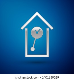 Silver Retro wall watch icon isolated on blue background. Cuckoo clock sign. Antique pendulum clock. Vector Illustration