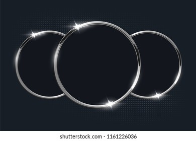 Silver rings on dark background. Vector design element.