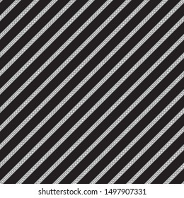 Silver ropes and cables diagonal seamless pattern on a black background. 