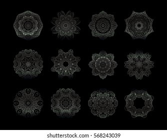 Silver round ornament pattern on black background. Kaleidoscope, medallion, tattoo, astrology, boho and magic symbol.