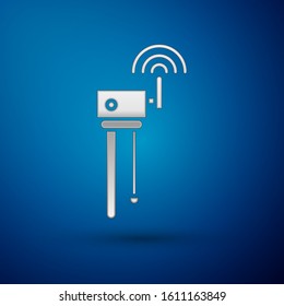 Silver Router and wi-fi signal symbol icon isolated on blue background. Wireless ethernet modem router. Computer technology internet.  Vector Illustration