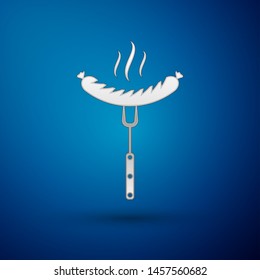 Silver Sausage on the fork with steam icon isolated on blue background. Grilled sausage and aroma sign. Vector Illustration