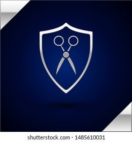 Silver Scissors hairdresser and shield icon isolated on dark blue background. Hairdresser, fashion salon and barber sign. Barbershop symbol.  Vector Illustration