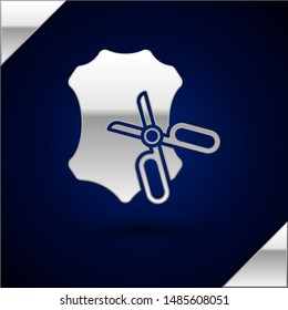 Silver Scissors and leather icon isolated on dark blue background. Tailor symbol. Cutting tool sign.  Vector Illustration