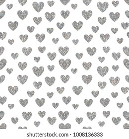 Silver seamless pattern of random hearts shape confetti. Design element for festive banner, greeting card, postcard, wedding invitation, Valentines day and save the date card. Vector illustration.