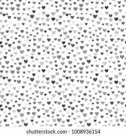 Silver seamless pattern of random hearts shape confetti. Design element for festive banner, greeting card, postcard, wedding invitation, Valentines day and save the date card. Vector illustration.