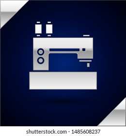 Silver Sewing machine icon isolated on dark blue background.  Vector Illustration