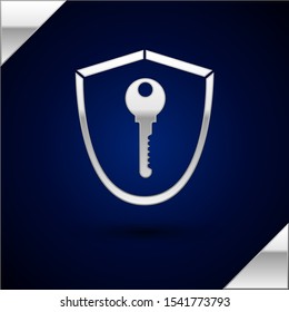Silver Shield with key icon isolated on dark blue background. Protection and security concept. Safety badge icon. Privacy banner. Defense tag.  Vector Illustration