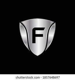 Silver Shield Logo Design for Letter F. Vector Realistic Metallic logo Template Design for Letter F. Silver Metallic Logo. Logo Design for car, safety companies and others.